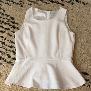 White sleeveless peplum top business casual blouse